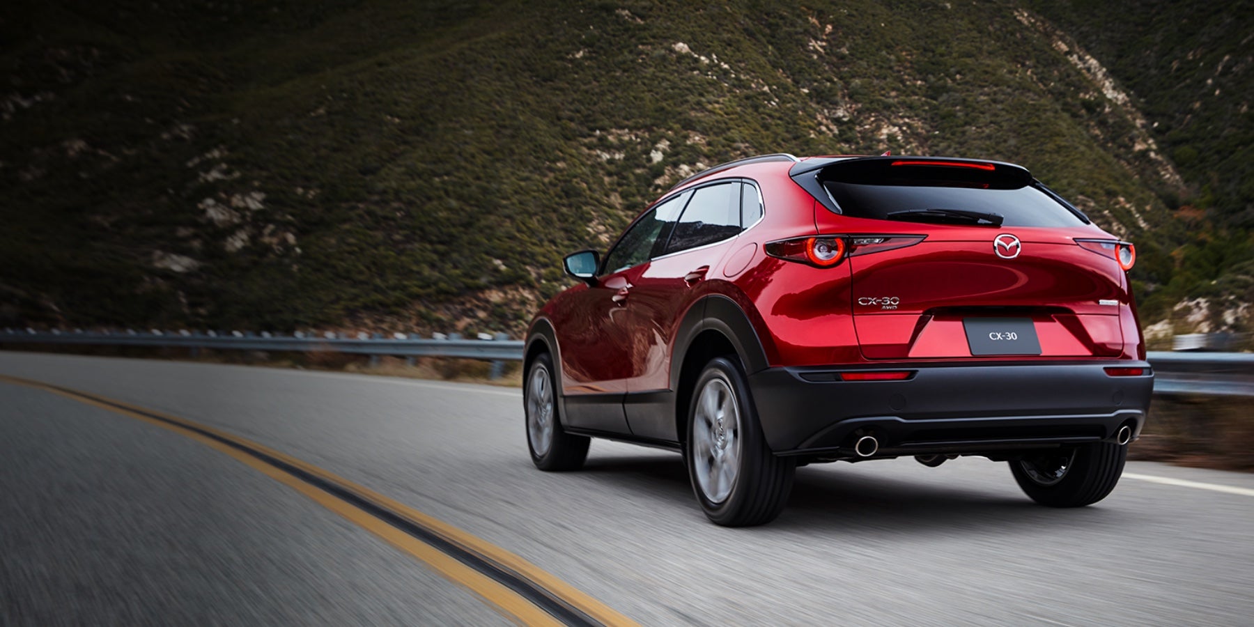 Red 2020 Mazda CX-30 Driving on the road | Royal Moore Mazda in Hillsboro, OR